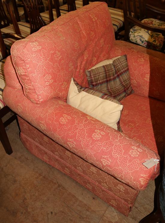 Large armchair upholstered in mustard linen, with matching footstool